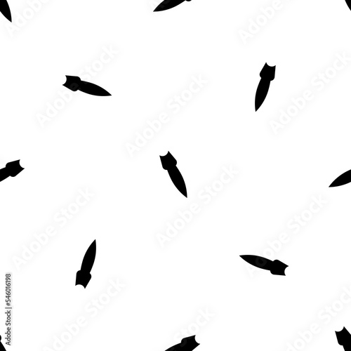 Seamless pattern of repeated black falling rocket symbols. Elements are evenly spaced and some are rotated. Vector illustration on white background