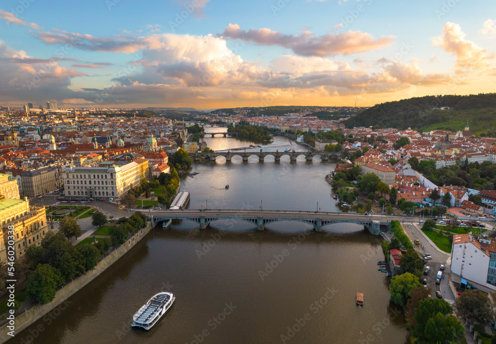 Obraz premium Bridges crossing a river in Europe at sunset