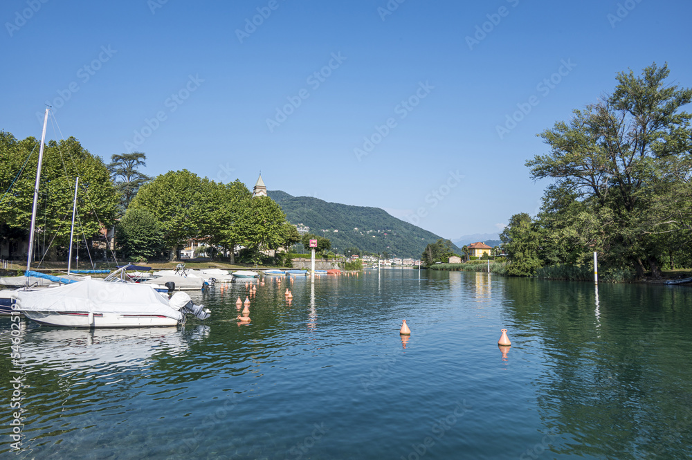The canal of Lavena in the Lake Lugano The canal of Lavena in the Lake Lugano