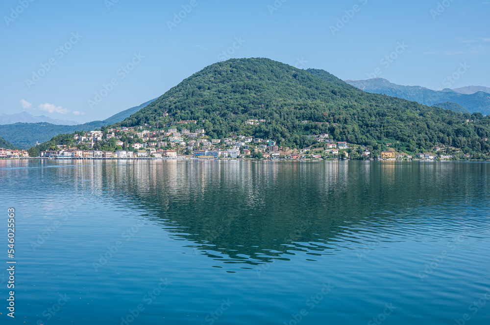 landscape of the Lake Lugano with Ponte Tresa reflecting on the water