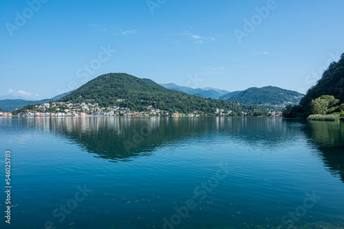 Landscape of the Lake Lugano with Ponte Tresa reflecting on the water