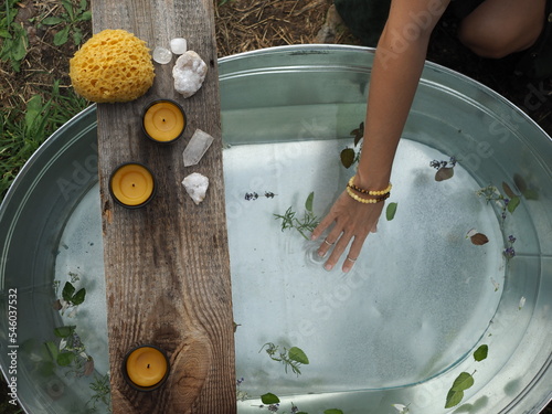 Photography the girl takes herbal medicinal baths