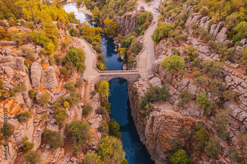Stone bridge with river from Koprulu Tazi Canyon. Manavgat Antalya Turkey aerial top view