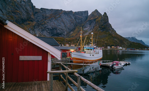 Sceninc View at Reine at Lofoten Islands in Norway with reflexions of robuer and boats on the water