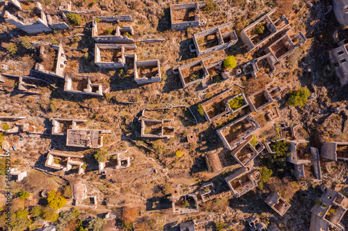 Aerial top view ancient city of stone lycian Greek village of Kayakoy, Fethiye Turkey