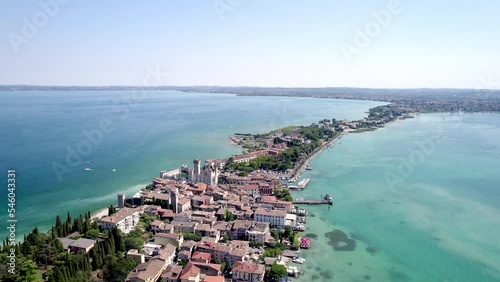 Drone shot over a Sirmione town around Lake Garda in Italy photo