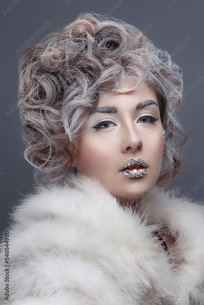 Beautiful fashion model girl with snow hair style and make up. Winter Queen. Winter Beauty. Beautiful fashion model girl with snow hair style and make up. Winter Queen. Winter Beauty.