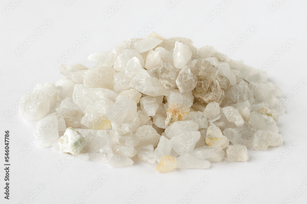 Pile of stones Quartz natural mineral on a white background