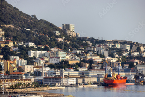 City Buildings, Port and Mountain by the Sea. Sunny Sky. Gibraltar, United Kingdom.