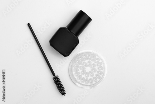 Fototapeta Naklejka Na Ścianę i Meble -  Tools for eyelashes, tweezers and brush. Black and white.