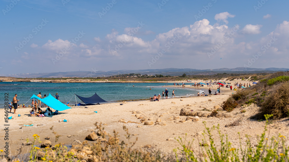 Panoramic view of Dor Beach National Park at the end of Summer early Autumn. People enjoying the last warm days of Autumn.
