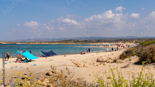 Panoramic view of Dor Beach National Park at the end of Summer early Autumn. People enjoying the last warm days of Autumn. 