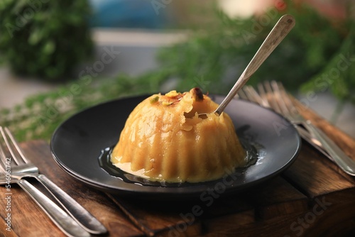 pudding,custard or indian famous sweet halwa closeup with selective focus and blur