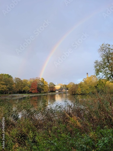 Vertical shot of the rainbow over Leazes Park in Newcastle upon Tyne, United Kingdom photo