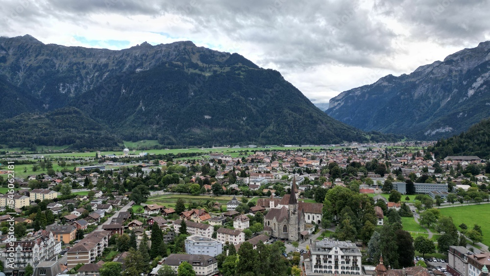 View of a small town surrounded by mountains. Interlaken, Switzerland.