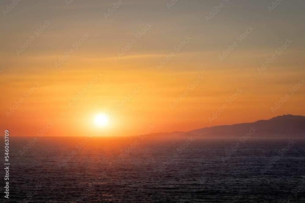 Dramatic sunset view over the sea water