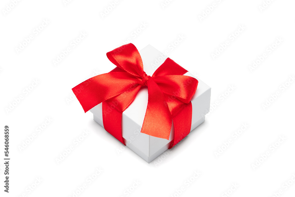 Close up shot of white present bow decorated with red satin ribbon tied bow, isolated over white background Close up shot of white present bow decorated with red satin ribbon tied bow, isolated over white background