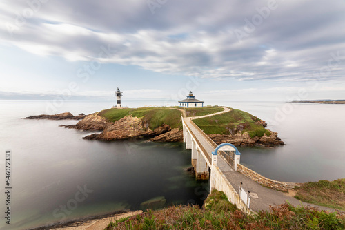 Pancha Island (Illa Pancha) on the coast of the municipality of Ribadeo. It has a very steep and jagged orography, although with a flat top, where an important lighthouse built in 1857 is installed.  photo