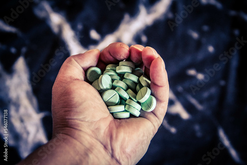 hand full of pills 