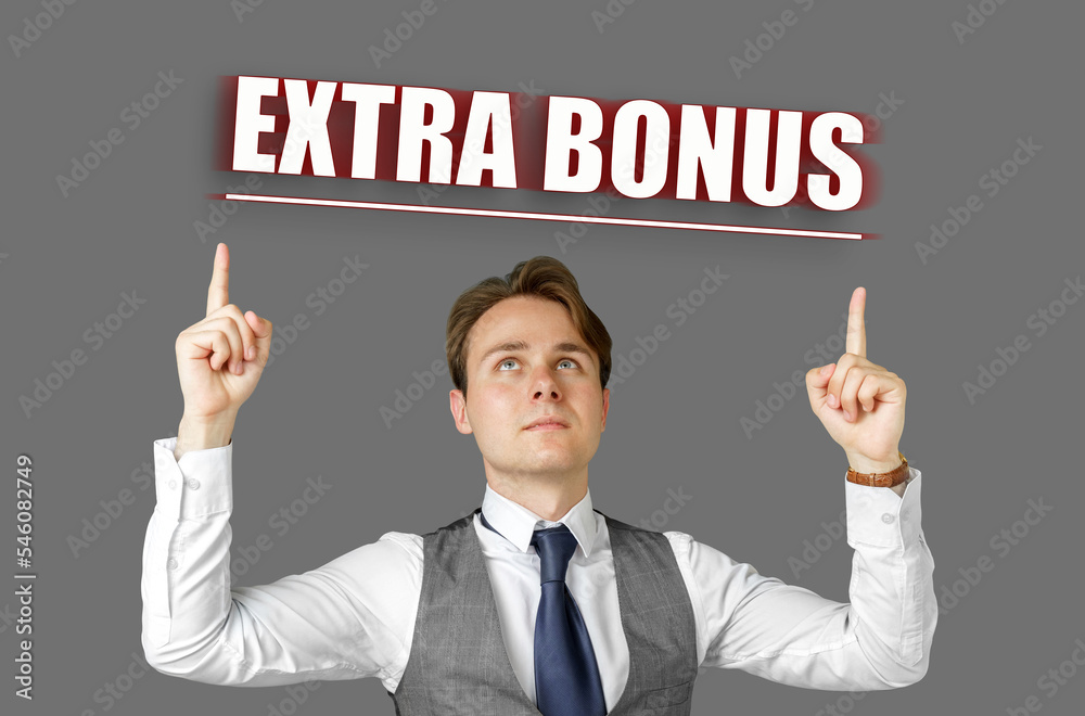 Businessman points fingers at the inscription - Extra Bonus