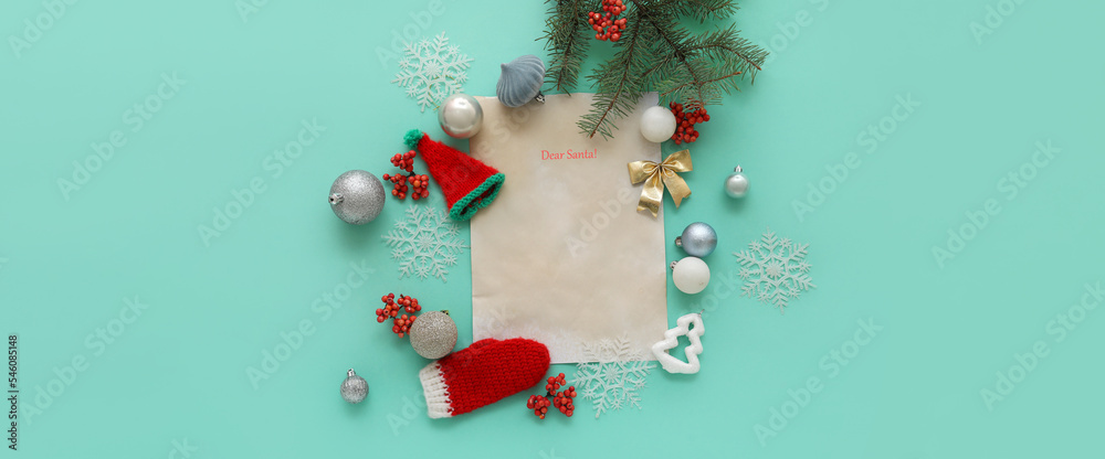 Composition with blank letter to Santa and beautiful Christmas decorations on turquoise background