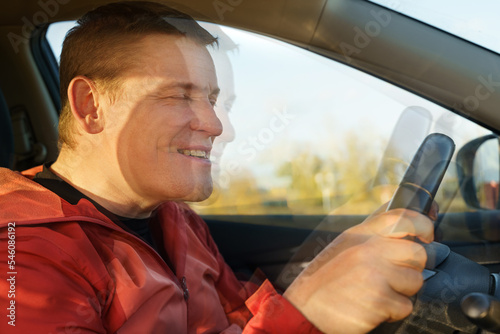 Drunk driver driving a car, the image is bifurcated. © Dzmitry