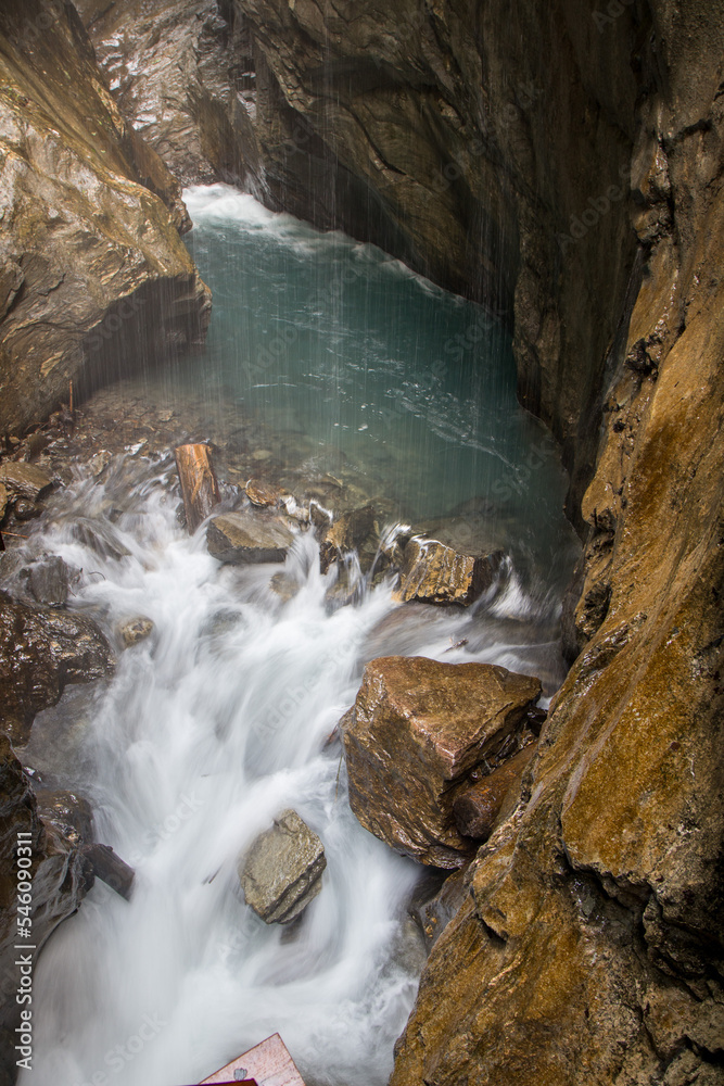 Naklejka premium The beautiful view of Sigmund Thun Gorge - Sigmund Thun Klamm. Cascade valley of wild Kapruner Ache near Kaprun, Austria. Crystal clear blue water. 4K background, HD wallpaper.
