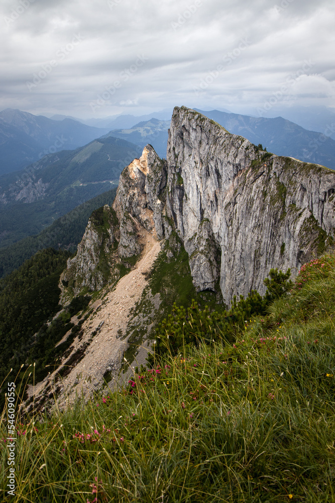 Obraz premium The beautiful portrait view of Schafberg,1783 m, during cloudy day, mountain in the Austrian state of Salzburg. Spinnerin summit. Austria, Europe.
