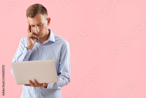 Thoughtful young man with l...