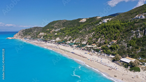 Aerial drone photo of famous paradise bay and beach of Kathisma with deep turquoise sea in island of Lefkada, Ionian, Greece © aerial-drone