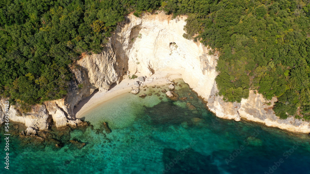 Aerial drone photo of famous small bay and beach with crystal clear sea and caves of Desimi near Nidri in island of Lefkada, Ionian, Greece
