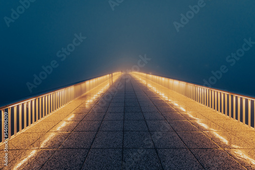 Bridge in Zadar, lights dissapearing in morning fog