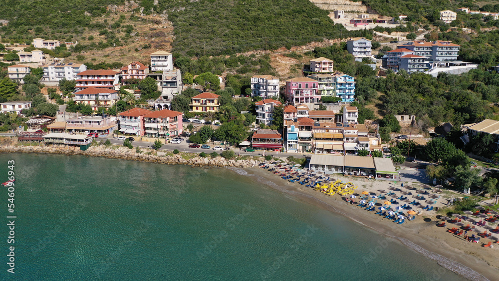 Aerial drone photo of beautiful seaside village and bay of Vasiliki famous for surfing activities, Lefkada island, Ionian, Greece