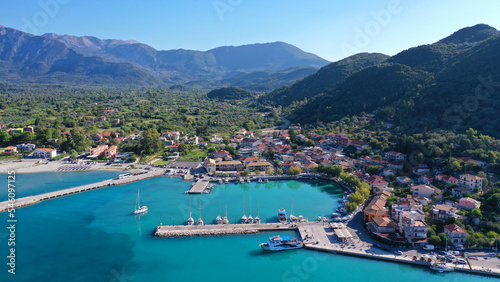 Aerial drone photo of beautiful seaside village and bay of Vasiliki famous for surfing activities, Lefkada island, Ionian, Greece