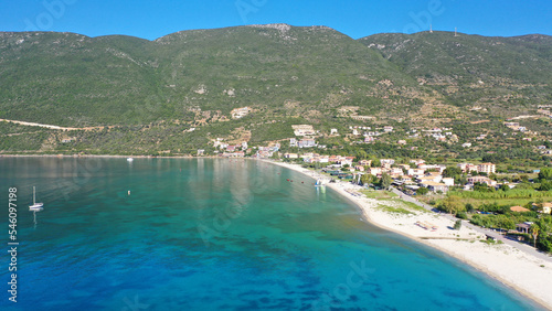 Aerial drone photo of beautiful seaside village and bay of Vasiliki famous for surfing activities, Lefkada island, Ionian, Greece