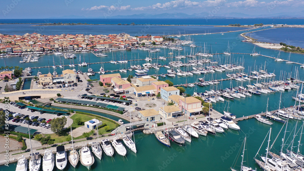 Fototapeta premium Aerial drone photo of famous marina of Lefkada island town with anchored yachts and sailboats, Ionian, Greece