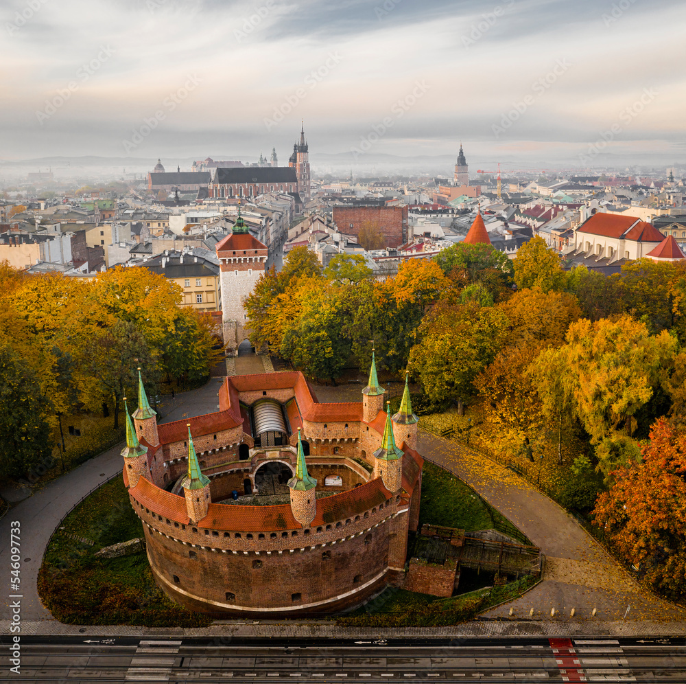 Barbican and Old Town in Krakow in autumn scenery - obrazy, fototapety, plakaty 