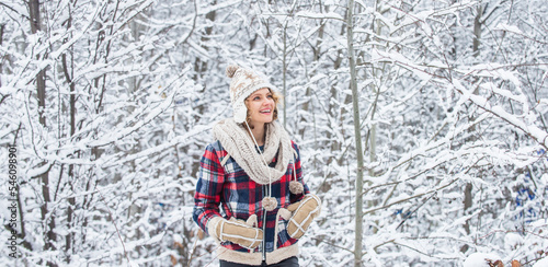 Warm clothes. my favorite season. happy weather. full of energy. winter holiday and vacation. best place to feel freedom. woman enjoy winter landscape. girl relax in snowy forest. female casual style © be free