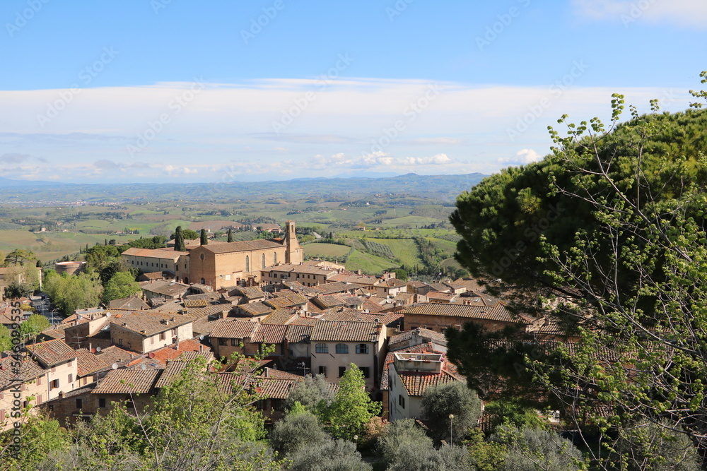 View to Chiesa di Sant'Agostino in San Gimignano in spring, Tuscany Italy