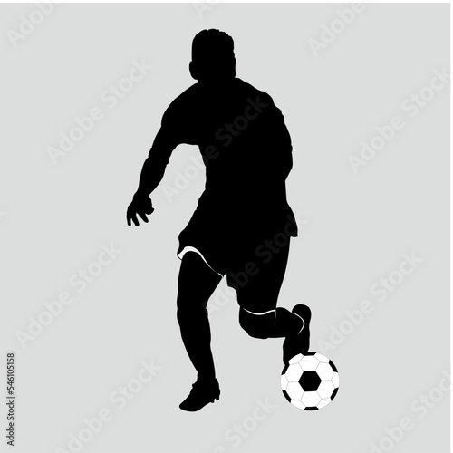 The soccer player is dribbling the ball © Yoyo