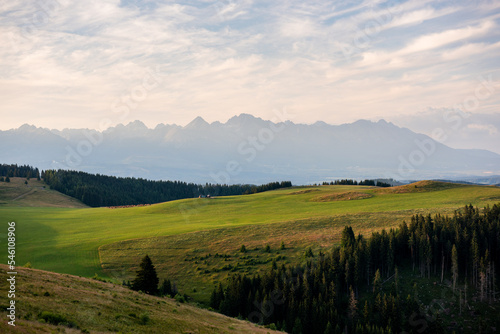 High Tatras from Panska Hola, Low Tatras National Park Slovakia.Green meadows and mountains in the background.