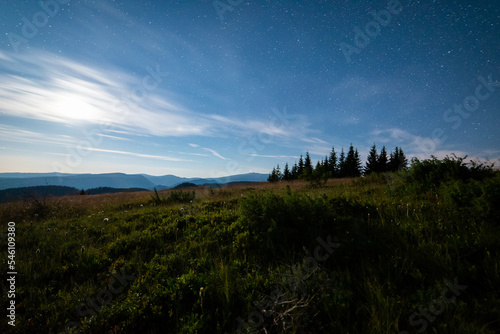 Fototapeta Naklejka Na Ścianę i Meble -  Night view of High Tatras from Panska Hola, Low Tatras National Park Slovakia.Green meadows and mountains in the background.
