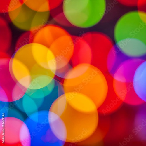 Full frame background with vibrant colorful blur bokeh circles. Abstract background with color bokeh effect