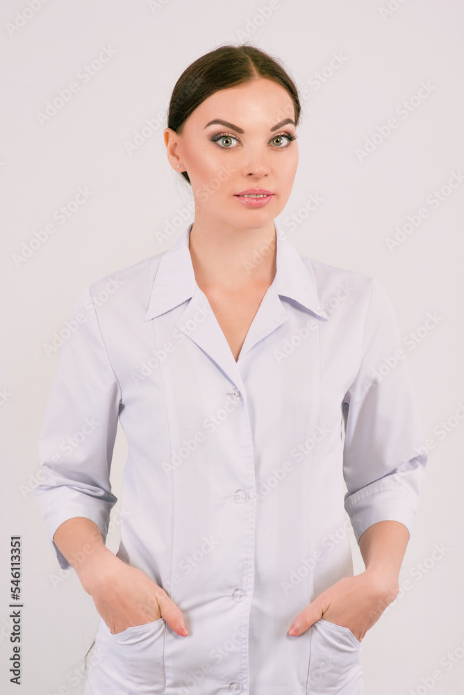 Caucasian woman doctor in white uniform Caucasian woman doctor in white uniform