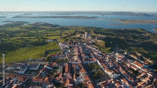 Aerial. View from above village and castle Mourao district Evora. Portugal. Castle facade entrance with tower in Alentejo photo