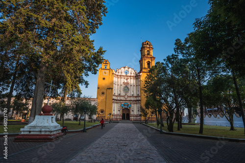 Main church of Metepec, Mexico, painted yellow in the baroque style photo