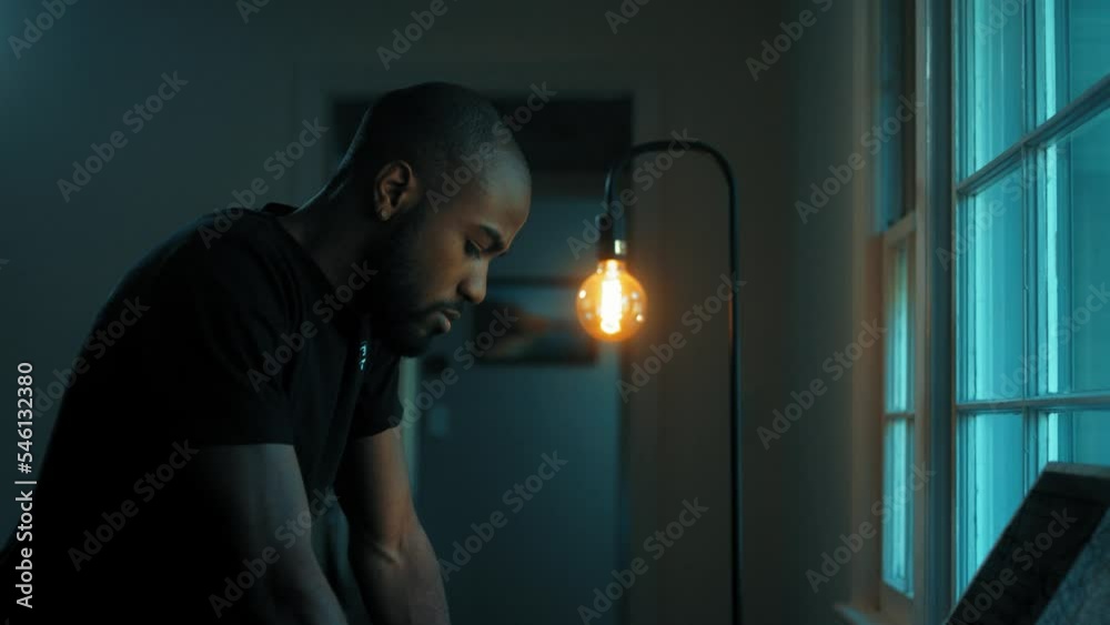 Man looks out the window Man looks out the window