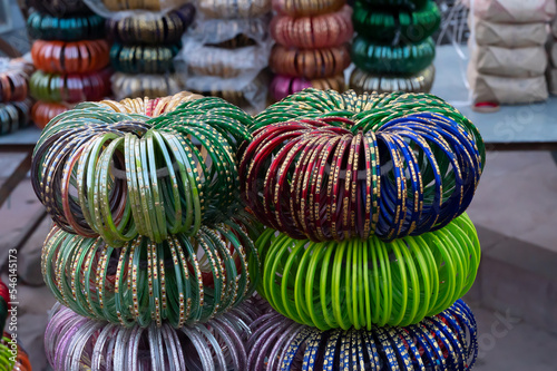 Colorful Rajasthani bangles being sold at famous Sardar Market and Ghanta ghar Clock tower in Jodhpur, Rajasthan, India. photo