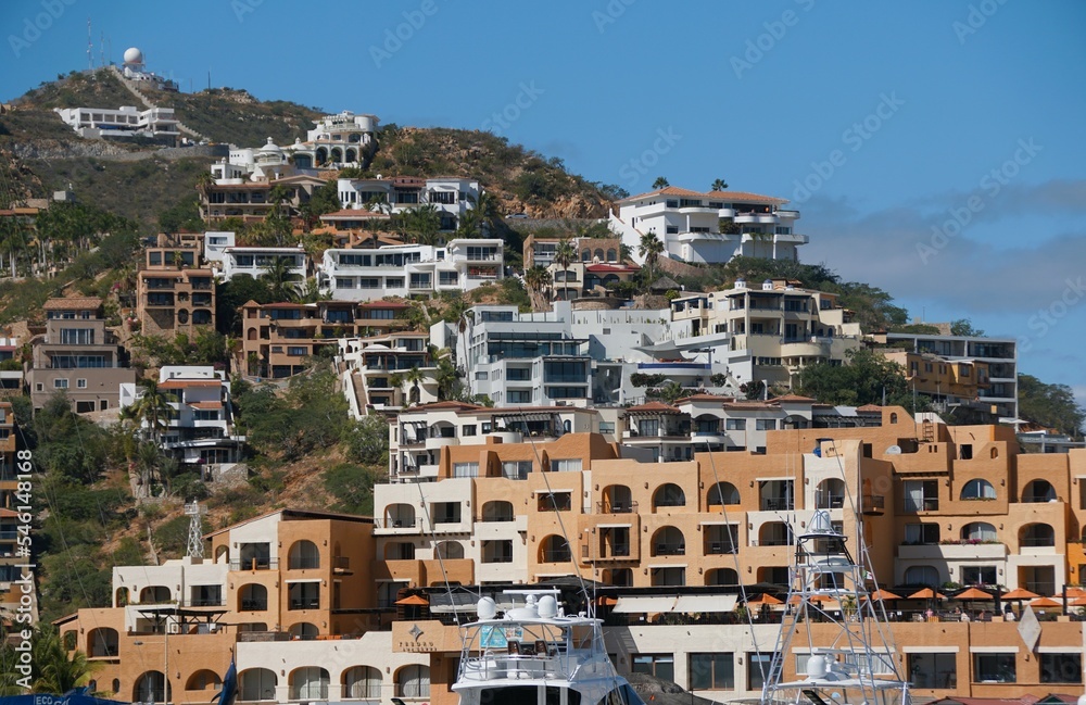 The view of luxury waterfront homes on top of the hill near Cabo San Lucas, Mexico