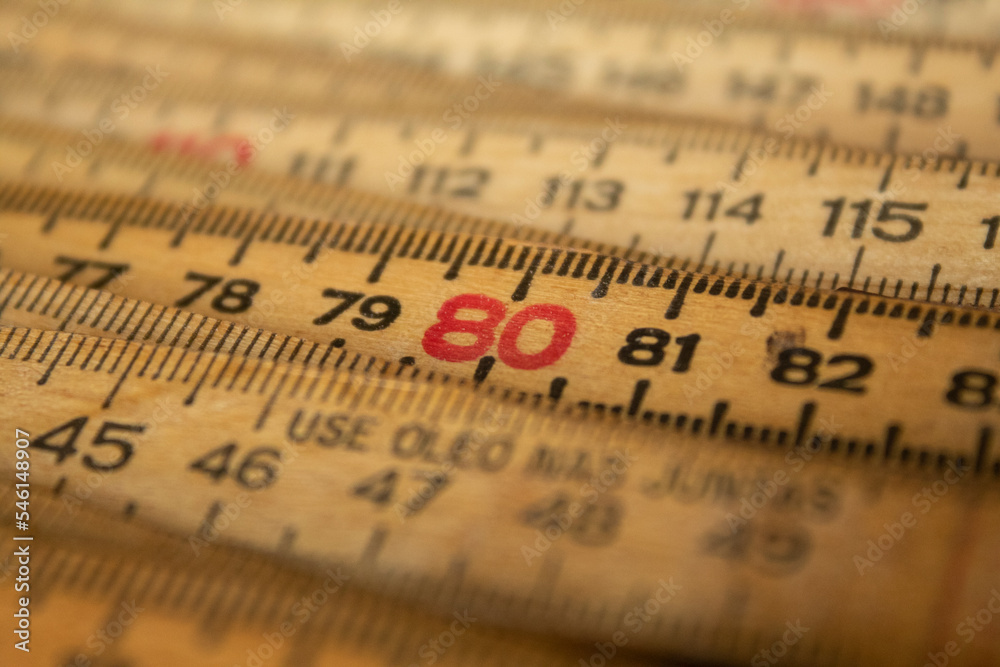 A wooden ruler with focus on eighty centimeters A wooden ruler with focus on eighty centimeters